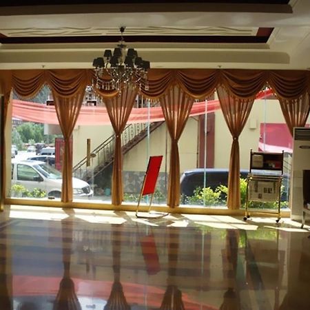 ג'יוג'איגואו An E Courtyard Hotel Jiu Zhai Gou Branch מראה חיצוני תמונה